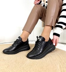 Чорні шкіряні жіночі кросівки